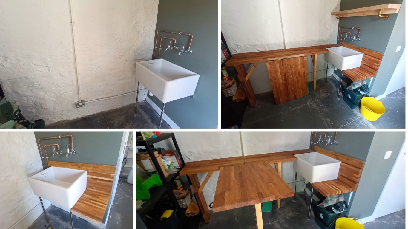 Wooden workbench with a white sink, positioned in a minimalist workshop setting.
